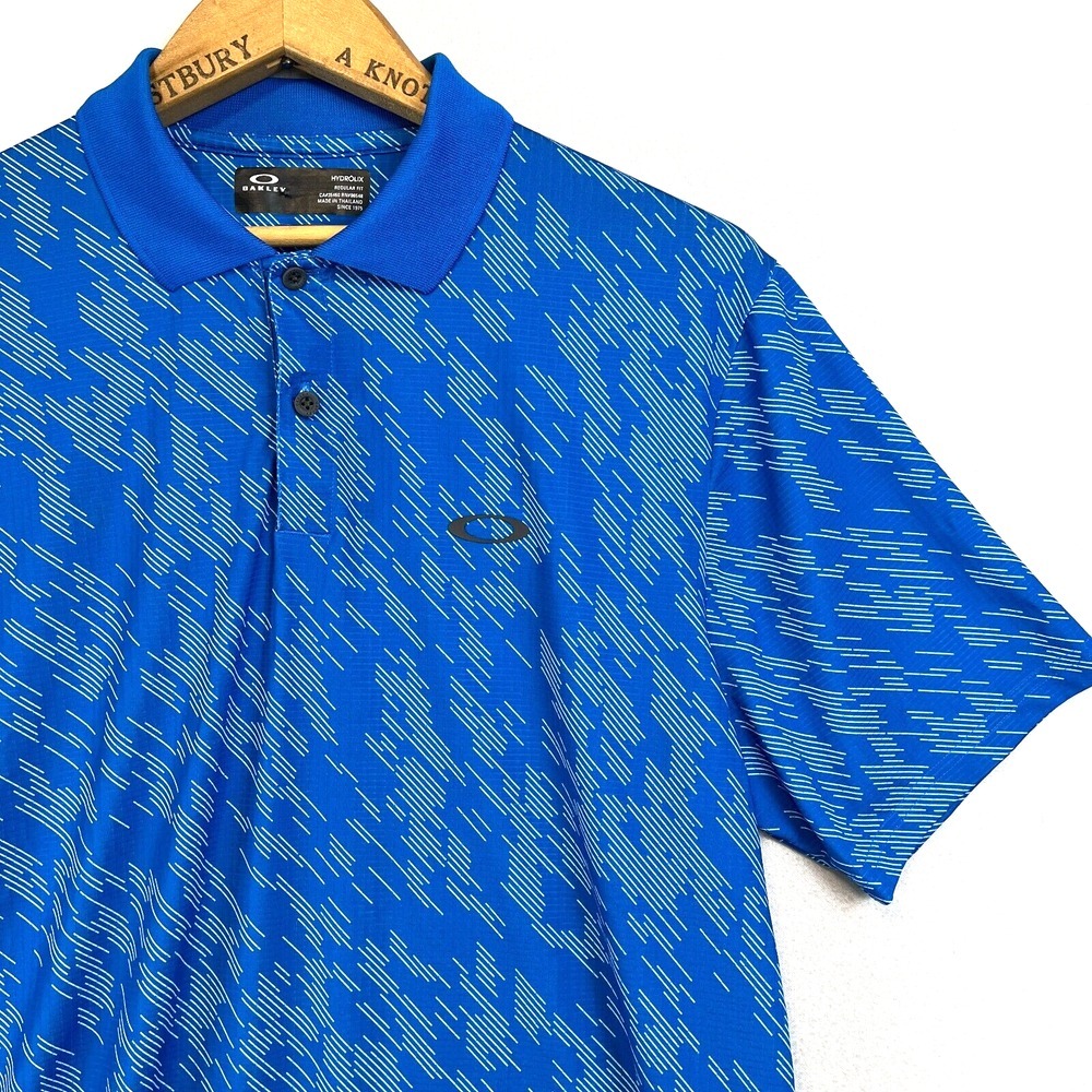 OAKLEY Mens Small Blue Short Sleeve Golf Polo Shirt All Over Print‎ Performance